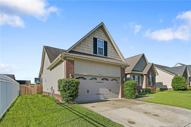 3811 Briargate Ln, Fayetteville, NC 28314 - traditional-style home with an attached garage, driveway, and brick siding