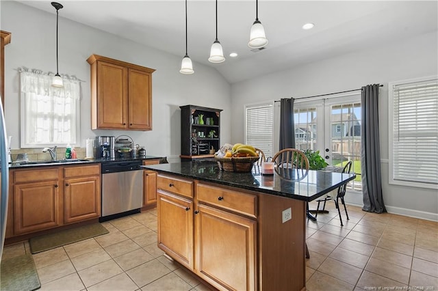 3811 Briargate Ln, Fayetteville, NC 28314 - kitchen featuring dishwasher, a sink, light tile patterned flooring, brown cabinets, and vaulted ceiling