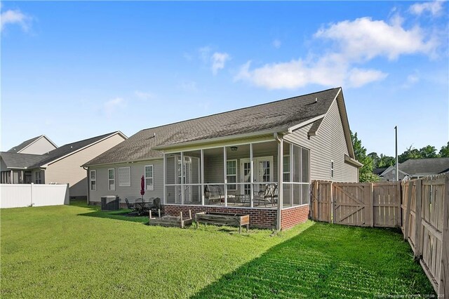 3811 Briargate Ln, Fayetteville, NC 28314 - rear view of house with a sunroom and cooling unit
