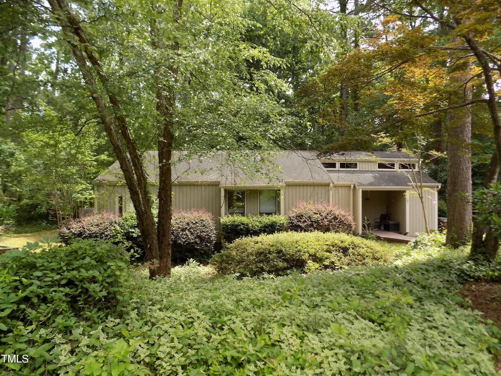 101 Solway Ct, Cary, NC 27511 - view of side of property featuring a shingled roof