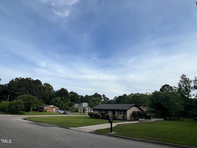 1512 Bacon St, Durham, NC 27701 - view of asphalt road featuring curbs