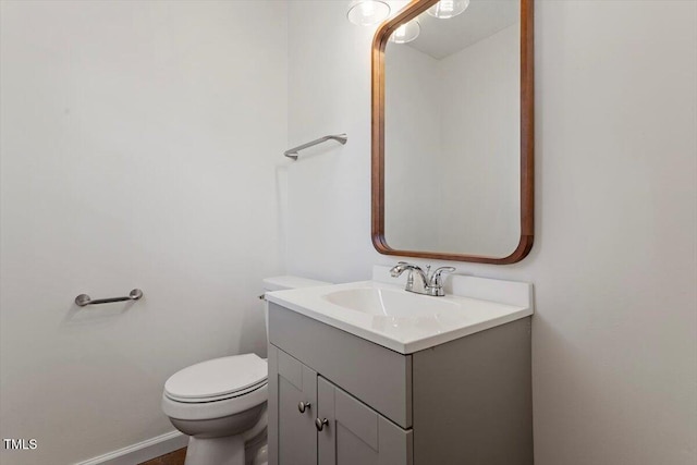 1512 Bacon St, Durham, NC 27701 - bathroom with vanity, toilet, and baseboards