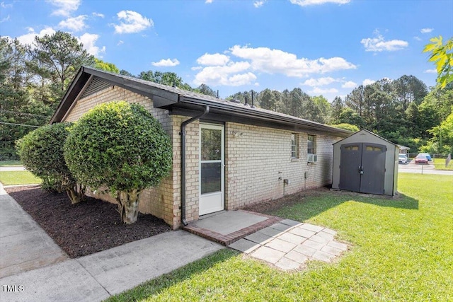 1512 Bacon St, Durham, NC 27701 - back of property with a yard, brick siding, and cooling unit