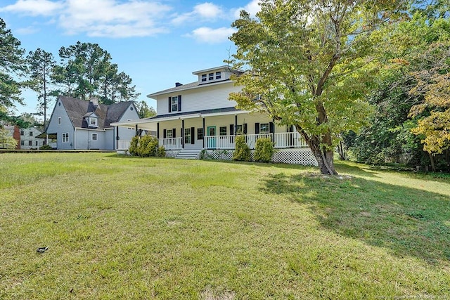 201 N College St, Red Springs, NC 28377 - view of front facade featuring a porch and a front lawn