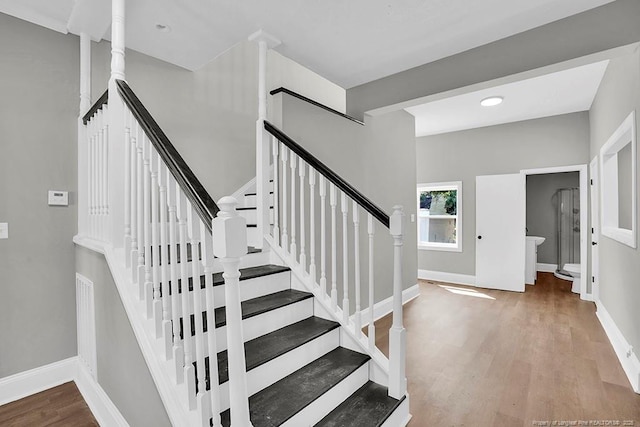 201 N College St, Red Springs, NC 28377 - stairway with wood finished floors and baseboards
