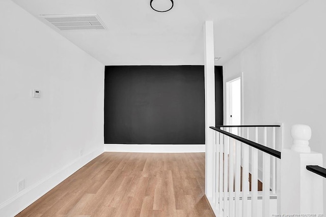 201 N College St, Red Springs, NC 28377 - unfurnished room with wood finished floors and baseboards