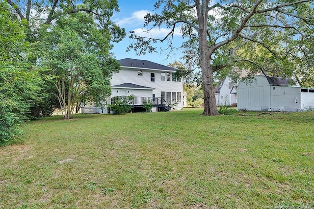 201 N College St, Red Springs, NC 28377 - view of green lawn featuring a deck