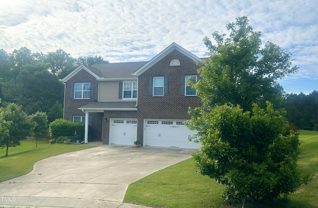 1116 Powder, Fuquay Varina, NC 27526 - view of front of house with a garage, brick siding, concrete driveway, and a front yard