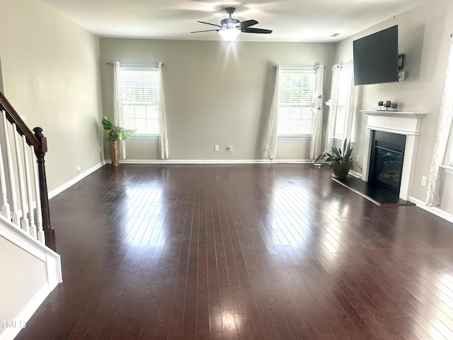 1116 Powder, Fuquay Varina, NC 27526 - unfurnished living room with ceiling fan and dark wood-type flooring
