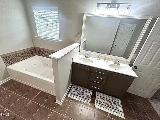 1116 Powder, Fuquay Varina, NC 27526 - full bathroom featuring a whirlpool tub, tile patterned floors, double vanity, and baseboards