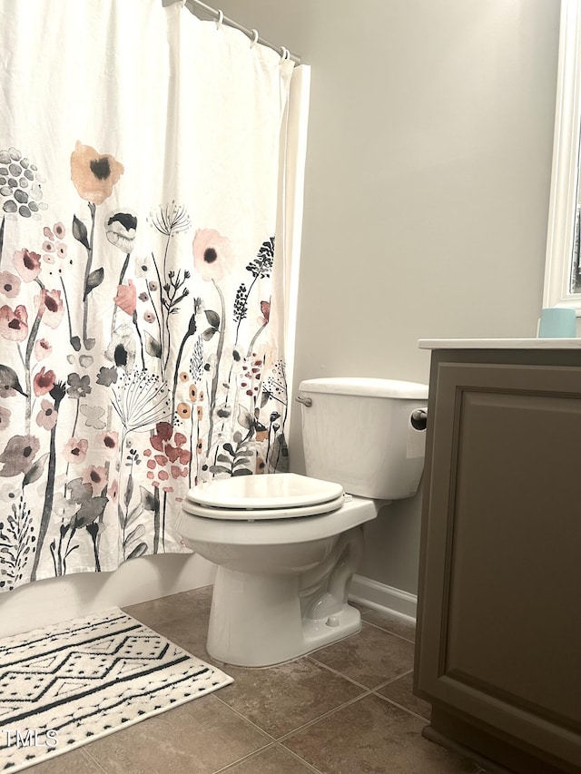 1116 Powder, Fuquay Varina, NC 27526 - full bathroom with toilet, tile patterned flooring, baseboards, a shower with curtain, and vanity