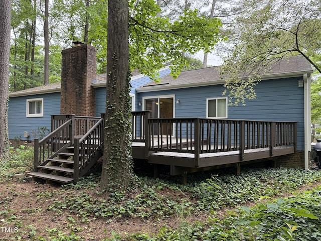 507 Holtz Ln, Cary, NC 27511 - rear view of property with a deck and stairway