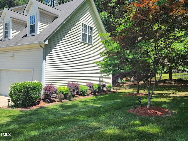 18 Clover Hil Pl, Durham, NC 27712 - view of property exterior featuring a yard and roof with shingles