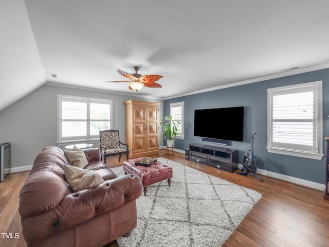 321 Commons Walk Cir, Cary, NC 27519 - living room with wood finished floors, a ceiling fan, crown molding, baseboards, and vaulted ceiling