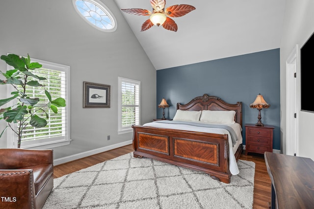 321 Commons Walk Cir, Cary, NC 27519 - bedroom with high vaulted ceiling, wood finished floors, baseboards, and a ceiling fan