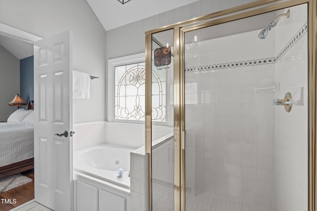 321 Commons Walk Cir, Cary, NC 27519 - ensuite bathroom with a garden tub, a stall shower, and vaulted ceiling