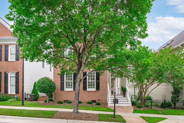 321 Commons Walk Cir, Cary, NC 27519 - view of front facade featuring brick siding and crawl space
