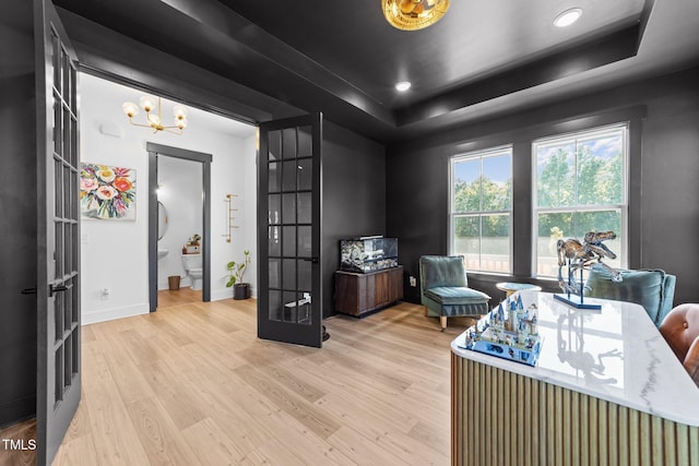 105 Scotland Dr, Youngsville, NC 27596 - office space with light wood-style floors, a raised ceiling, french doors, baseboards, and a chandelier