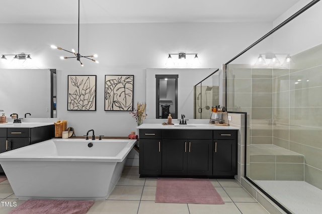 105 Scotland Dr, Youngsville, NC 27596 - full bathroom featuring tile patterned flooring, vanity, a freestanding bath, and a stall shower