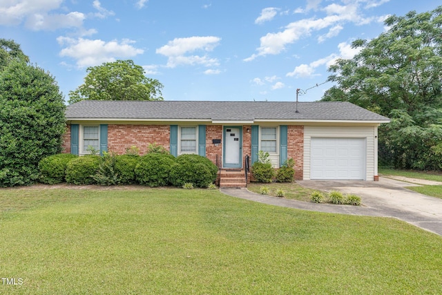 1304 Park Ave, Dunn, NC 28334 - single story home with driveway, a garage, a front yard, brick siding, and a shingled roof