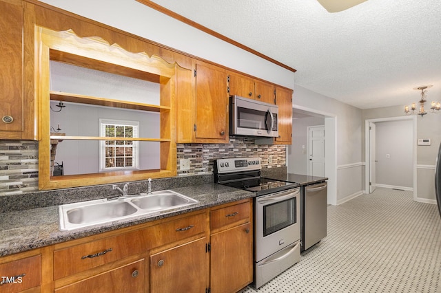 1304 Park Ave, Dunn, NC 28334 - kitchen with appliances with stainless steel finishes, a sink, decorative backsplash, open shelves, and a textured ceiling