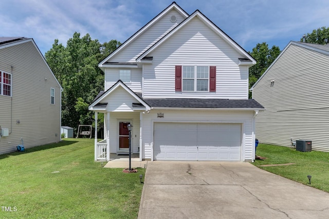 1310 Southgate Dr, Raleigh, NC 27610 - traditional-style house with a garage, a front yard, concrete driveway, roof with shingles, and central AC unit