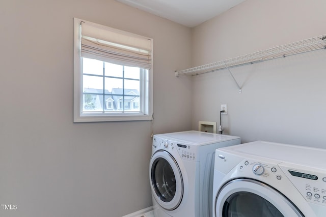 1310 Southgate Dr, Raleigh, NC 27610 - laundry area featuring washer and dryer and baseboards
