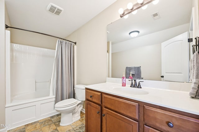 1004 Lake Michael Way, Mebane, NC 27302 - full bath featuring toilet, vanity, shower / bath combo with shower curtain, and stone finish flooring