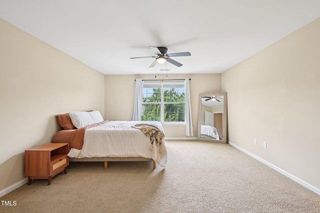 1004 Lake Michael Way, Mebane, NC 27302 - bedroom featuring baseboards, light colored carpet, and a ceiling fan