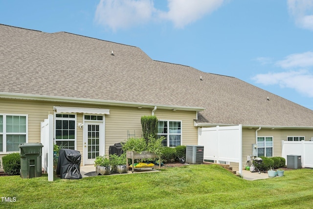 1004 Lake Michael Way, Mebane, NC 27302 - back of house with central air condition unit, a shingled roof, and a patio