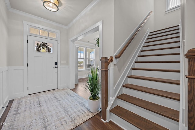 232 Duncan Creek Rd, Lillington, NC 27546 - entryway featuring stairs, wood finished floors, ornamental molding, and a wainscoted wall