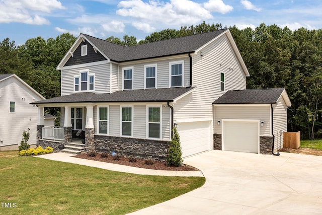 232 Duncan Creek Rd, Lillington, NC 27546 - view of front of home with a porch, driveway, a front yard, stone siding, and roof with shingles