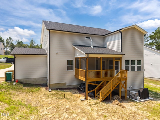 232 Duncan Creek Rd, Lillington, NC 27546 - rear view of house with a sunroom, a shingled roof, and stairway