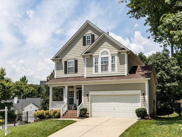 8001 Strawberry Meadows St, Raleigh, NC 27613 - traditional-style home featuring driveway, an attached garage, and a porch