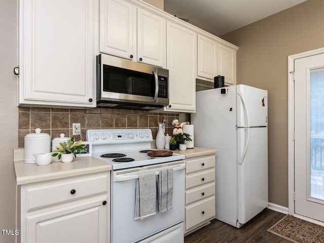 8001 Strawberry Meadows St, Raleigh, NC 27613 - kitchen with white appliances, decorative backsplash, dark wood finished floors, and light countertops