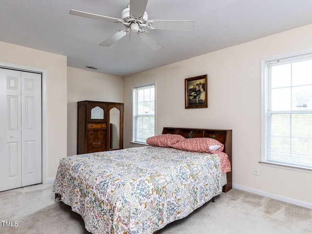 8001 Strawberry Meadows St, Raleigh, NC 27613 - carpeted bedroom with a closet and ceiling fan