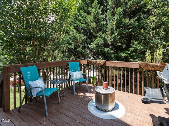 8001 Strawberry Meadows St, Raleigh, NC 27613 - wooden terrace with area for grilling