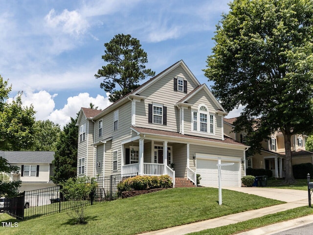 8001 Strawberry Meadows St, Raleigh, NC 27613 - traditional-style home with a garage, covered porch, and driveway