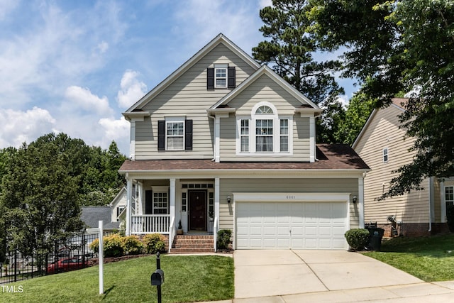 8001 Strawberry Meadows St, Raleigh, NC 27613 - traditional-style home featuring a porch and driveway