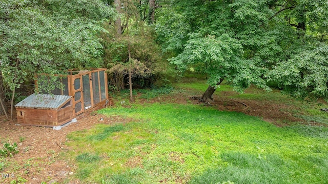 3803 Jonesville Rd, Wake Forest, NC 27587 - view of yard with exterior structure and an outdoor structure