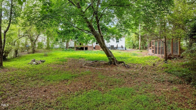 3803 Jonesville Rd, Wake Forest, NC 27587 - view of green lawn featuring a sunroom