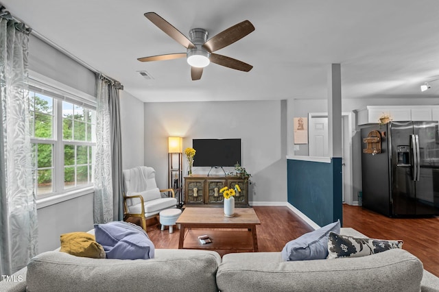 3803 Jonesville Rd, Wake Forest, NC 27587 - living area with a ceiling fan, wood finished floors, and baseboards