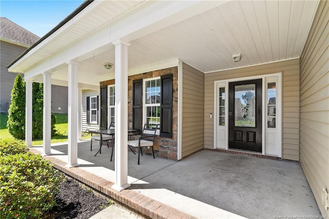 1517 Seabiscuit Dr, Parkton, NC 28371 - property entrance with a porch