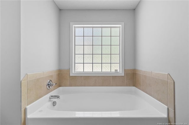 1517 Seabiscuit Dr, Parkton, NC 28371 - bathroom featuring a garden tub