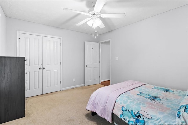 1517 Seabiscuit Dr, Parkton, NC 28371 - carpeted bedroom featuring a closet, ceiling fan, and baseboards