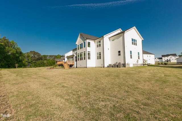 1475 Sierra Glen Cir, Apex, NC 27502 - rear view of house with a lawn, cooling unit, and a deck