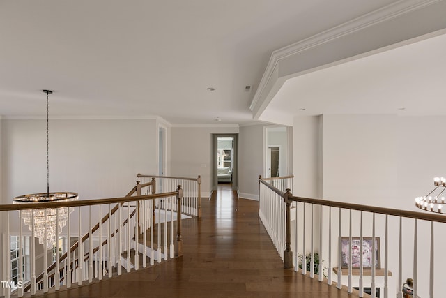 1475 Sierra Glen Cir, Apex, NC 27502 - hall with a chandelier, an upstairs landing, wood finished floors, crown molding, and baseboards