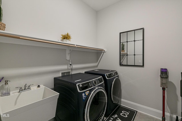 1475 Sierra Glen Cir, Apex, NC 27502 - laundry area with separate washer and dryer, baseboards, and tile patterned flooring