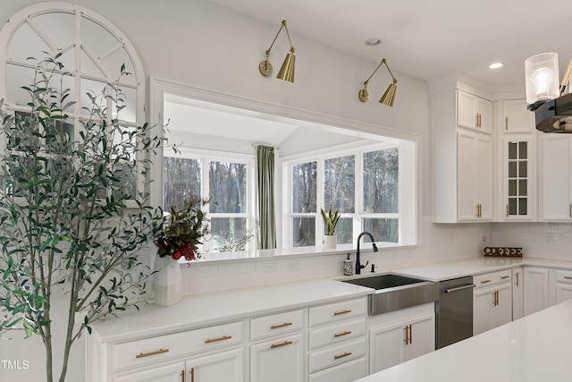 1475 Sierra Glen Cir, Apex, NC 27502 - kitchen featuring a sink, white cabinets, light countertops, stainless steel dishwasher, and recessed lighting