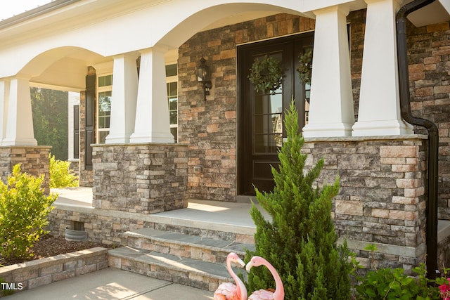 1475 Sierra Glen Cir, Apex, NC 27502 - property entrance featuring covered porch and stone siding